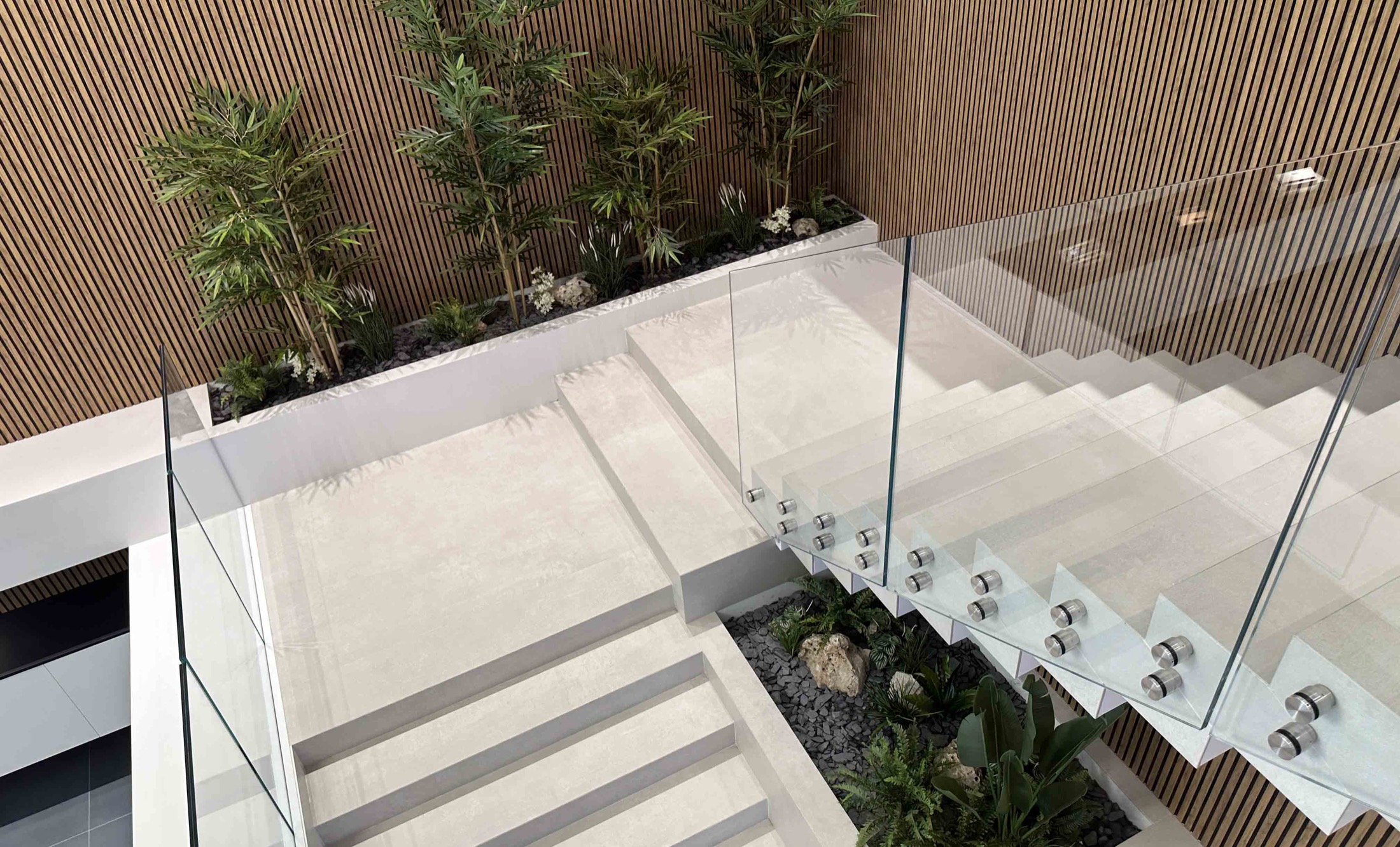 FLAEM NUOVA SPA sceglie BM Luxury per valorizzare la scala principale con un allestimento verde d'impatto